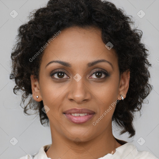 Joyful black young-adult female with medium  brown hair and brown eyes