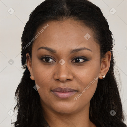 Joyful black young-adult female with long  brown hair and brown eyes