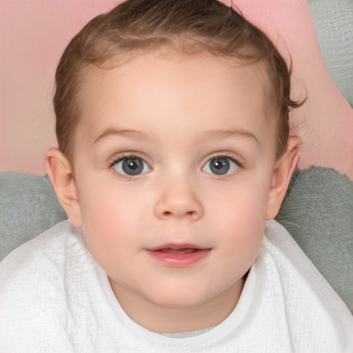 Joyful white child female with short  brown hair and blue eyes