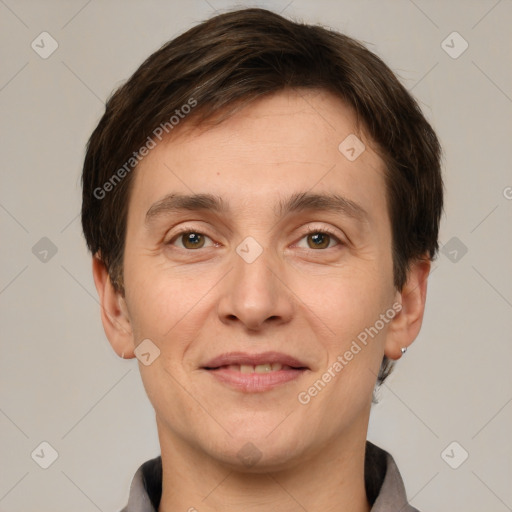 Joyful white adult male with short  brown hair and grey eyes