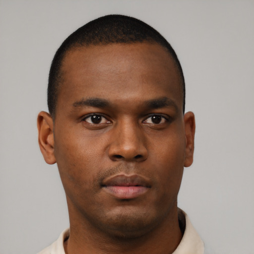 Neutral black young-adult male with short  black hair and brown eyes