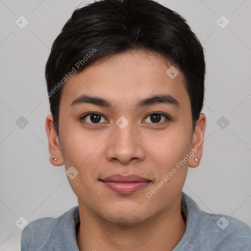 Joyful asian young-adult female with short  brown hair and brown eyes