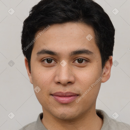 Joyful latino young-adult male with short  brown hair and brown eyes