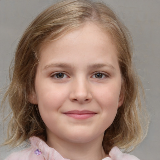 Joyful white child female with medium  brown hair and grey eyes