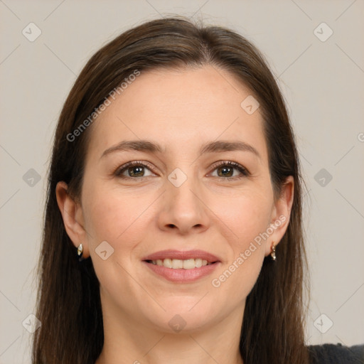 Joyful white young-adult female with long  brown hair and brown eyes