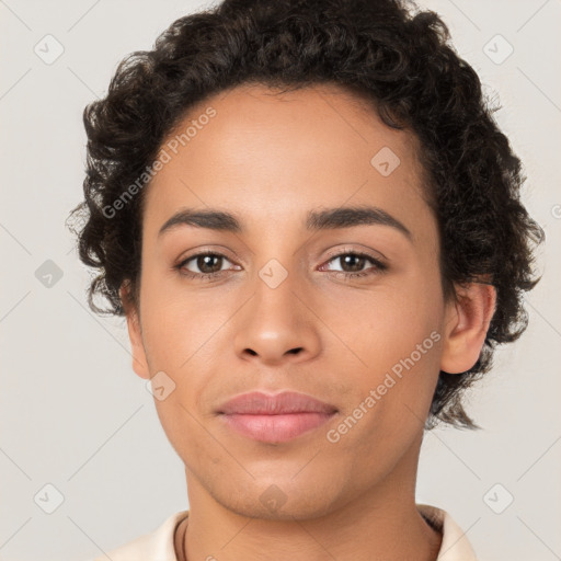 Joyful latino young-adult female with short  brown hair and brown eyes