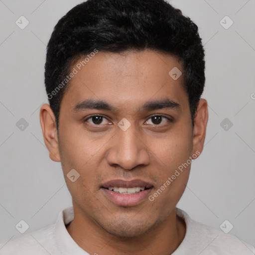 Joyful latino young-adult male with short  black hair and brown eyes