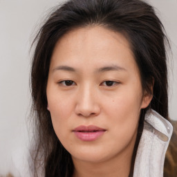 Neutral asian young-adult female with medium  brown hair and brown eyes