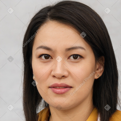 Joyful asian young-adult female with long  brown hair and brown eyes