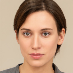 Neutral white young-adult female with short  brown hair and brown eyes