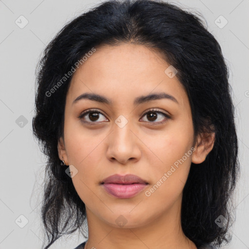 Joyful latino young-adult female with medium  black hair and brown eyes