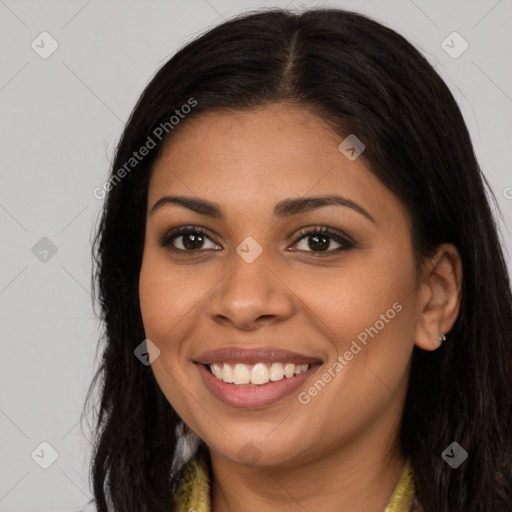 Joyful latino young-adult female with long  brown hair and brown eyes