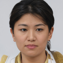 Neutral asian young-adult female with medium  brown hair and brown eyes