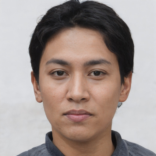 Neutral asian young-adult male with short  black hair and brown eyes