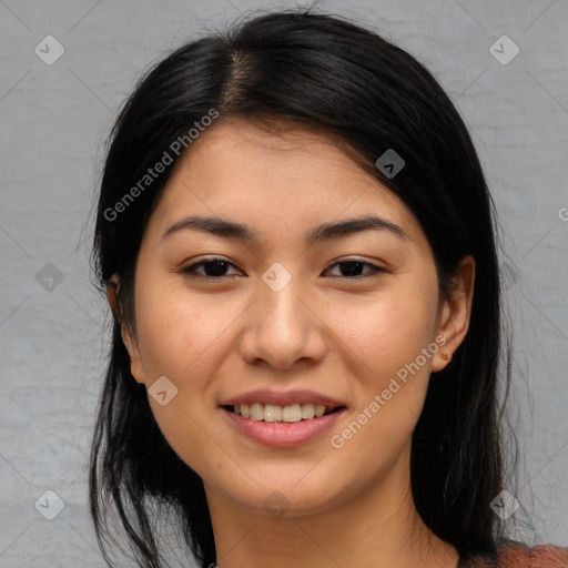 Joyful asian young-adult female with medium  black hair and brown eyes