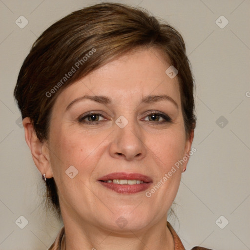 Joyful white adult female with medium  brown hair and grey eyes