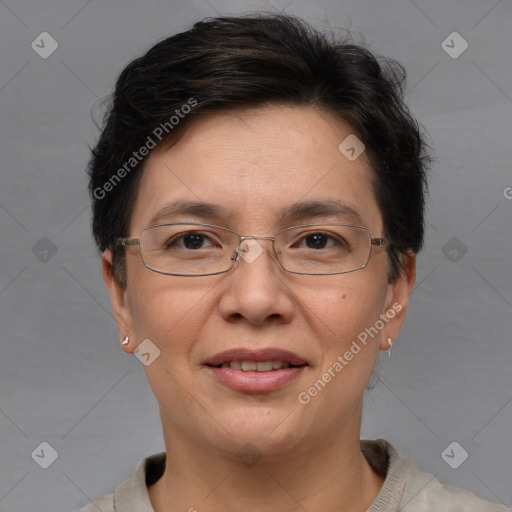 Joyful white adult female with short  brown hair and brown eyes