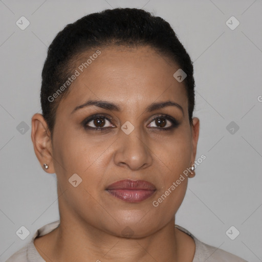 Joyful latino young-adult female with short  brown hair and brown eyes
