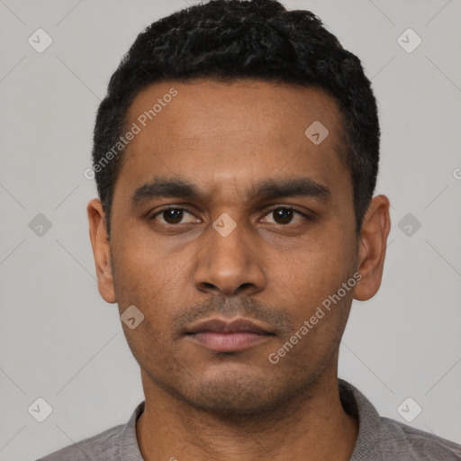 Neutral latino young-adult male with short  black hair and brown eyes