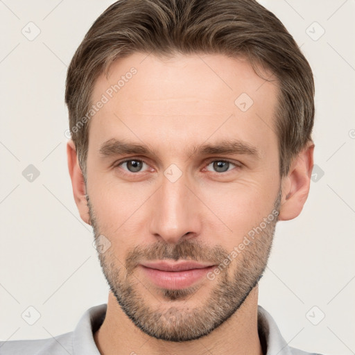 Neutral white young-adult male with short  brown hair and brown eyes