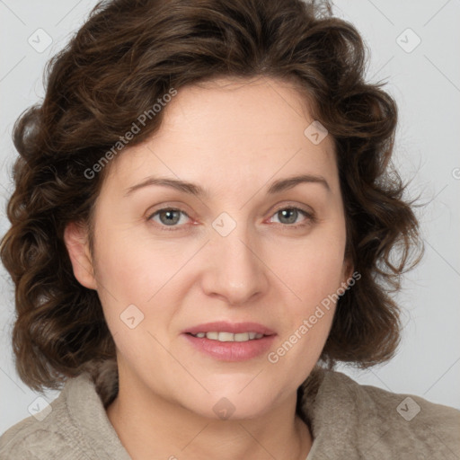 Joyful white young-adult female with medium  brown hair and green eyes