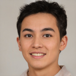 Joyful latino young-adult male with short  brown hair and brown eyes