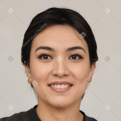 Joyful asian young-adult female with medium  black hair and brown eyes