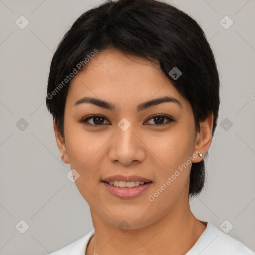 Joyful asian young-adult female with short  black hair and brown eyes