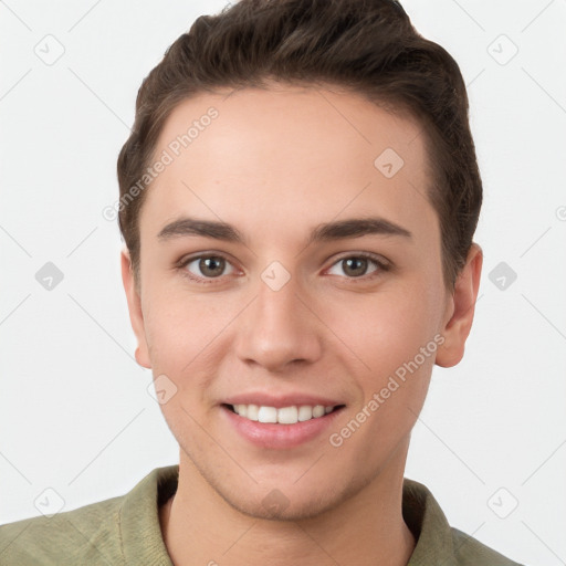 Joyful white young-adult female with short  brown hair and grey eyes