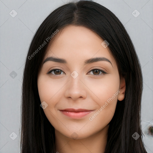 Joyful white young-adult female with long  black hair and brown eyes