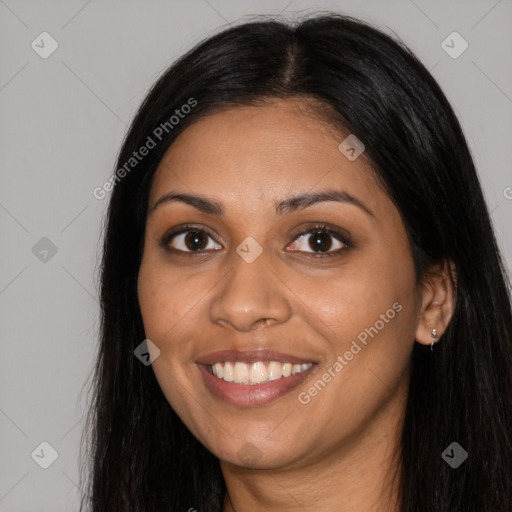 Joyful latino young-adult female with long  brown hair and brown eyes