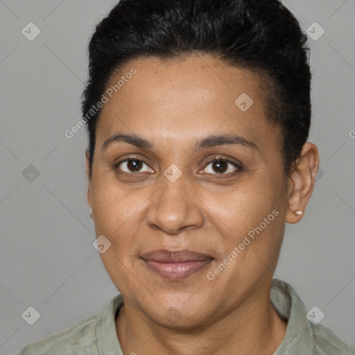 Joyful black adult female with short  brown hair and brown eyes