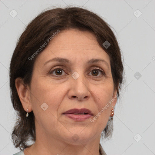 Joyful white adult female with medium  brown hair and brown eyes