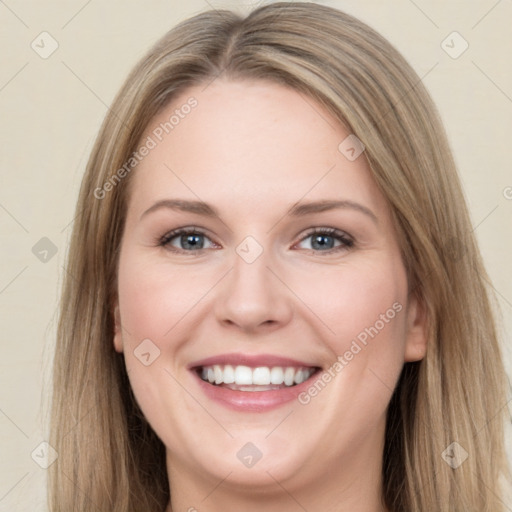 Joyful white young-adult female with long  brown hair and blue eyes