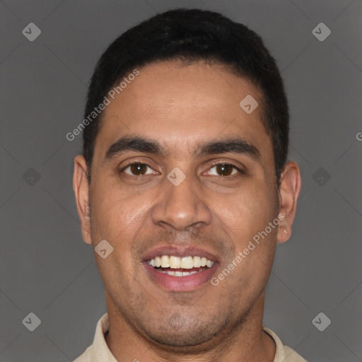 Joyful latino young-adult male with short  black hair and brown eyes