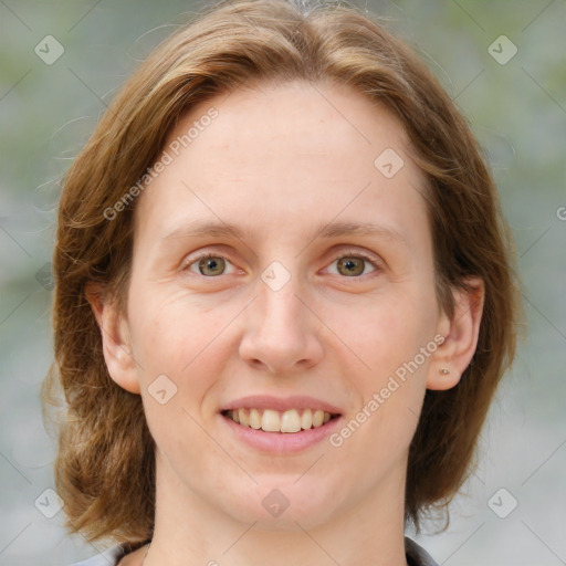 Joyful white young-adult female with medium  brown hair and blue eyes