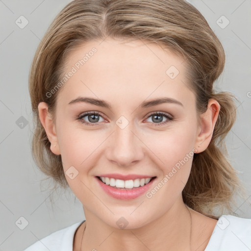 Joyful white young-adult female with medium  brown hair and blue eyes