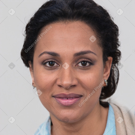 Joyful latino young-adult female with short  brown hair and brown eyes