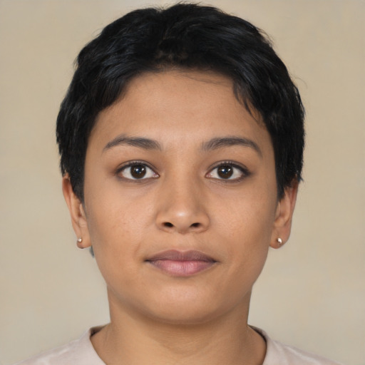 Neutral latino young-adult female with short  black hair and brown eyes