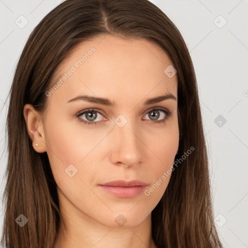 Neutral white young-adult female with long  brown hair and brown eyes