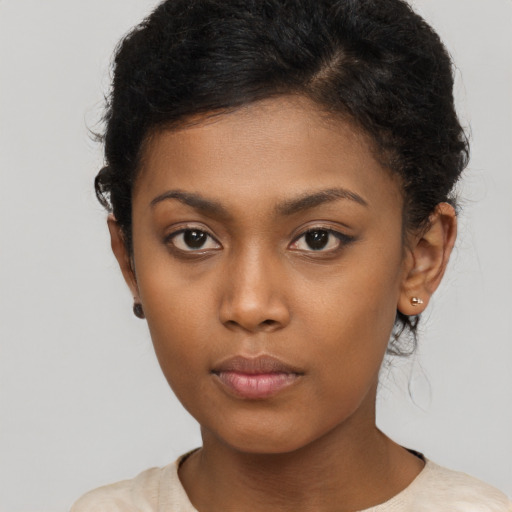 Neutral black young-adult female with short  brown hair and brown eyes