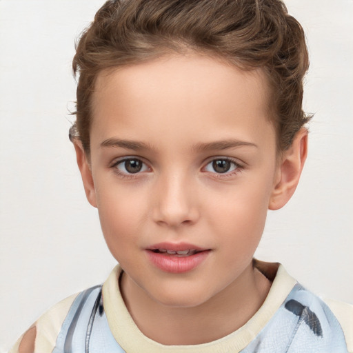 Joyful white child female with short  brown hair and brown eyes