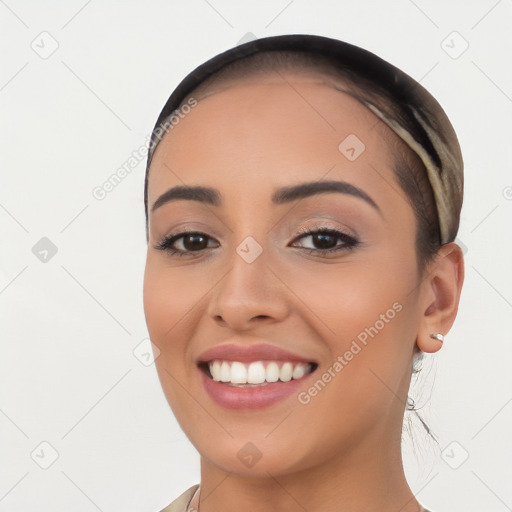 Joyful white young-adult female with long  black hair and brown eyes