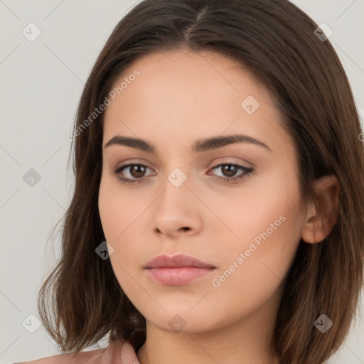 Neutral white young-adult female with long  brown hair and brown eyes