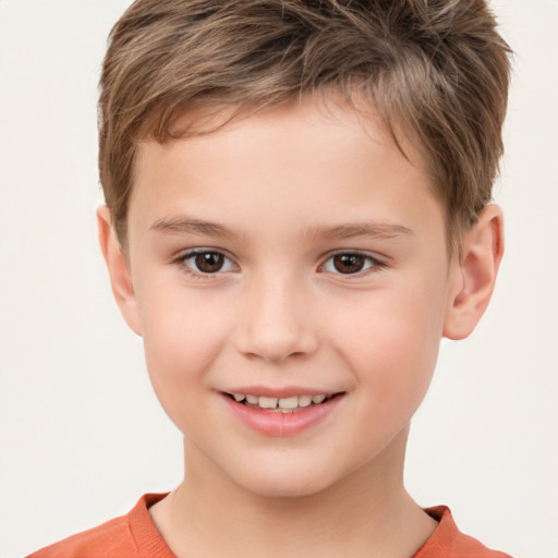 Joyful white child male with short  brown hair and brown eyes