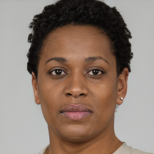 Neutral black young-adult female with short  brown hair and brown eyes