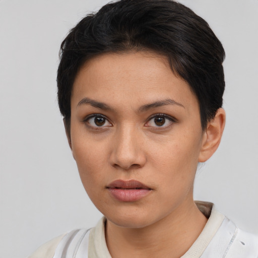 Neutral white young-adult female with short  brown hair and brown eyes