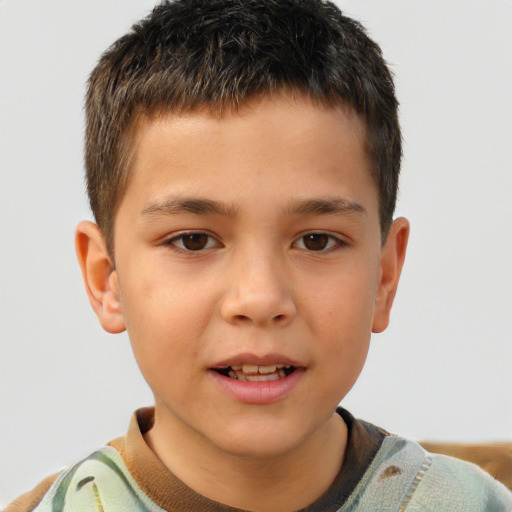 Joyful white child male with short  brown hair and brown eyes