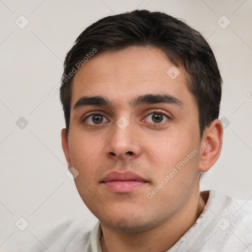 Neutral white young-adult male with short  brown hair and brown eyes