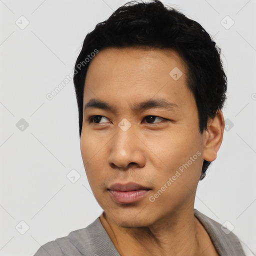 Neutral asian young-adult male with short  black hair and brown eyes